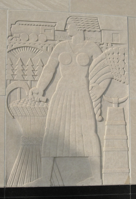 Relief detail outside the Ramsey courthouse - "Transportation" and "Abundance."